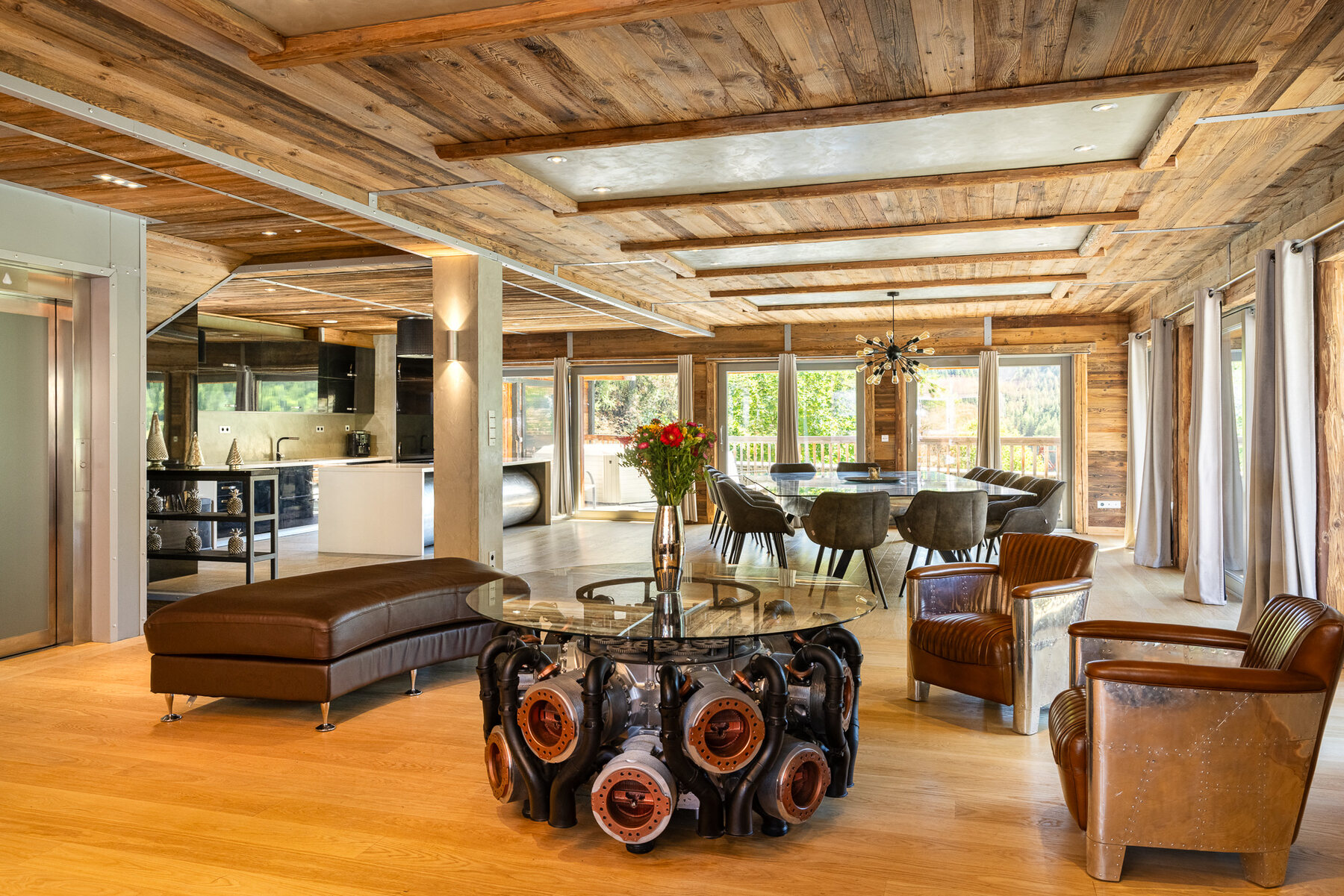 Chalet Squadron's living room in Tignes, centred on a coffee table built from an aircraft engine
