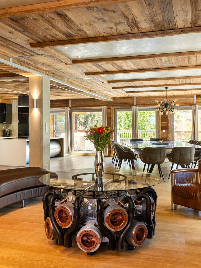 Chalet Squadron's living room in Tignes, centred on a coffee table built from an aircraft engine